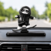Cute Black Panda Color Skateboarding Sliding on dashboard